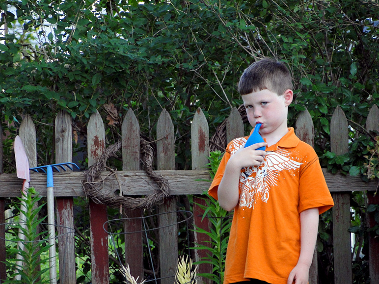 Andrew blowing up a balloon (I think ... and hope) (296.77 KB)